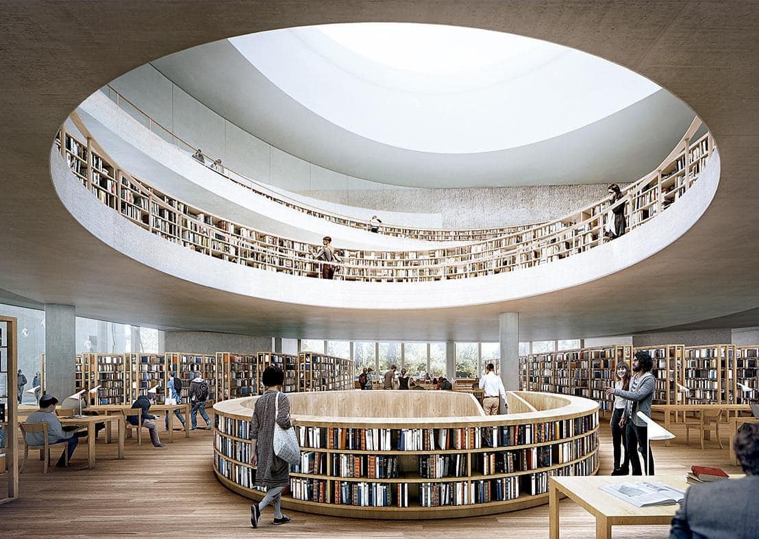 Biblioteca moderna con scaffali circolari e persone che leggono.